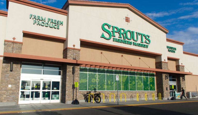 Prominently preferential bike parking incentivizes drivers to ride bikes and conveniently park right next to Sprouts Farmers Market entrances